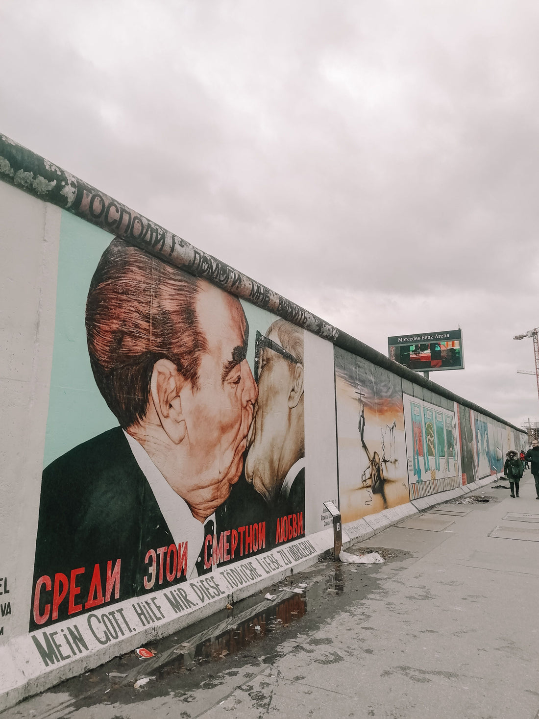 The Berlin East Side Gallery: Brotherly Kiss, Trabant Through the Wall, and the Night the Wall Opened