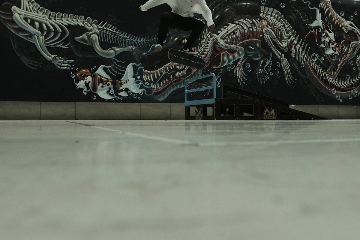 person skateboarding in white pavement
